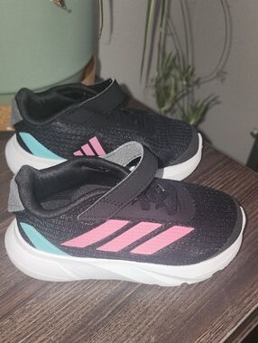 adidas Kids Black Sneakers with Pink Stripes and Teal Heel Accent